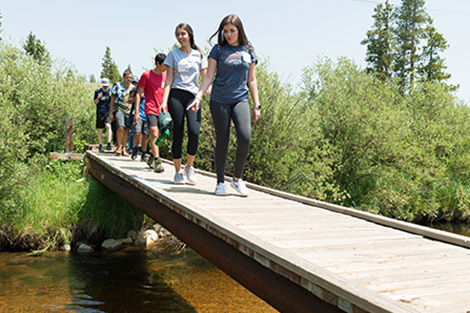 Students crossing bridge