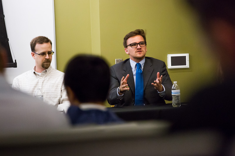 Michael Wells talks to students during a panel discussion about internships at Business Day